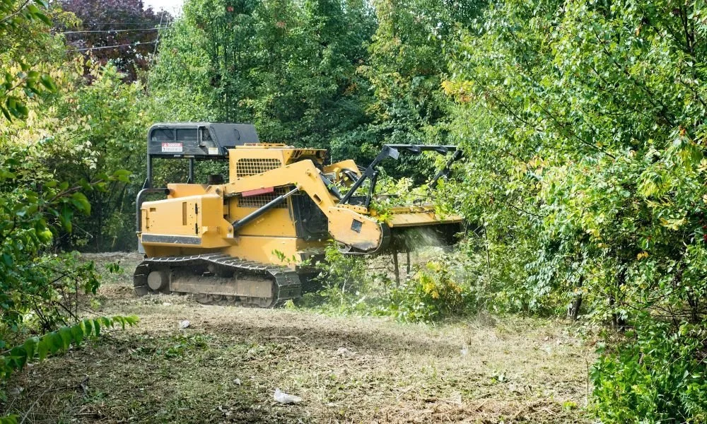 Forestry mulching equipment clearing land in Norman Oklahoma